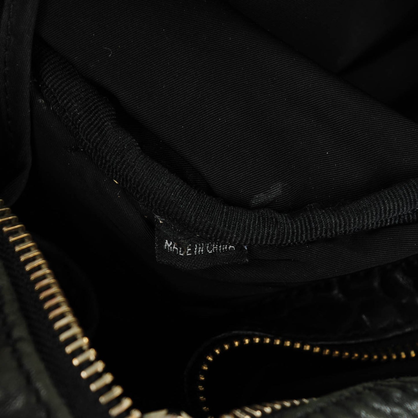 Pebbled Lambskin Rocco Duffel Black Pale Gold Hardware