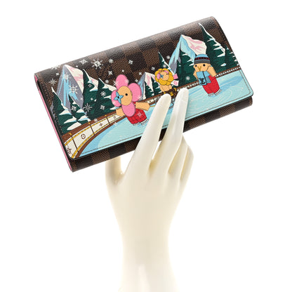 Louis Vuitton Damier Ebene 2023 Christmas Animation Ice Skating Sarah Wallet Pink 2 of 8