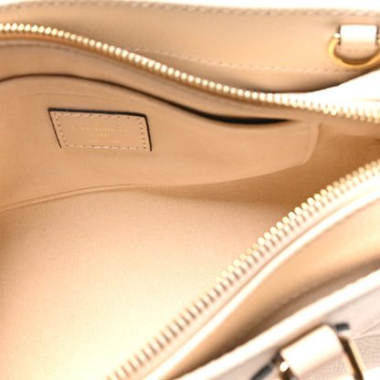 Louis Vuitton Empreinte Monogram Giant OnTheGo East West Creme 5 of 9
