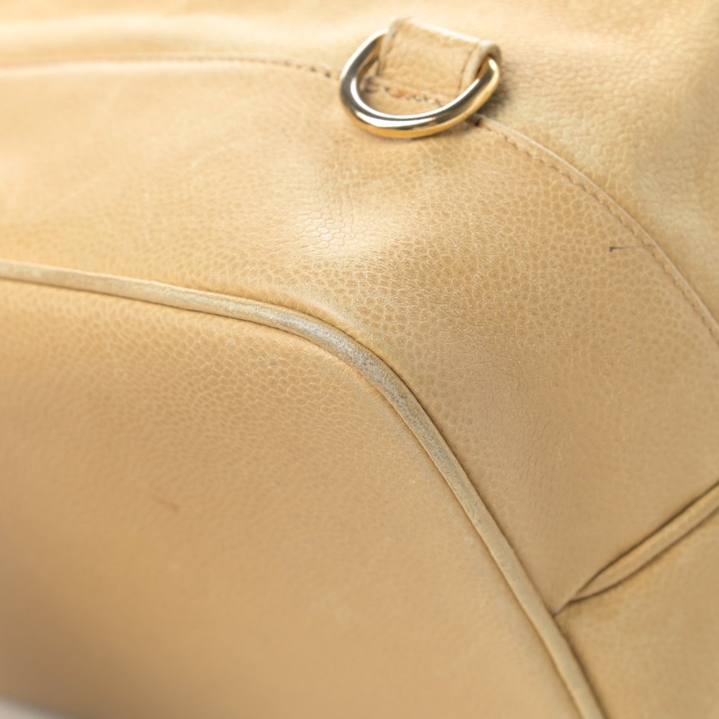 Caviar Drawstring Sling Backpack Beige
