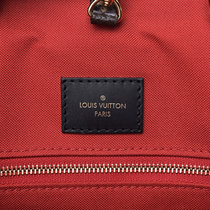 Louis Vuitton Reverse Monogram Giant Onthego MM 7 of 10