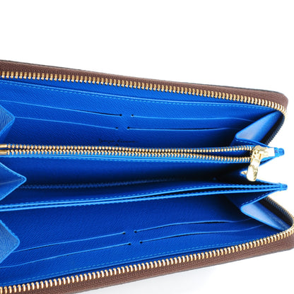 Louis Vuitton Monogram Kusama Pumpkin Dots Zippy Wallet Blue 5 of 9