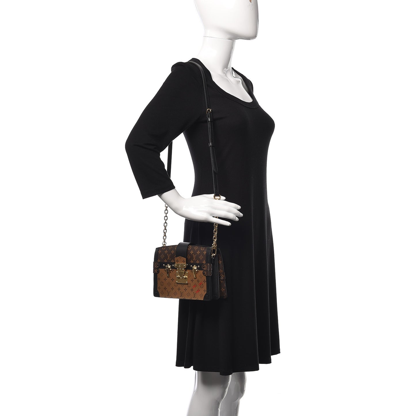 Reverse Monogram Trunk Clutch