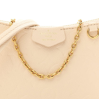 Louis Vuitton Empreinte Easy Pouch On Strap Cream 7 of 9