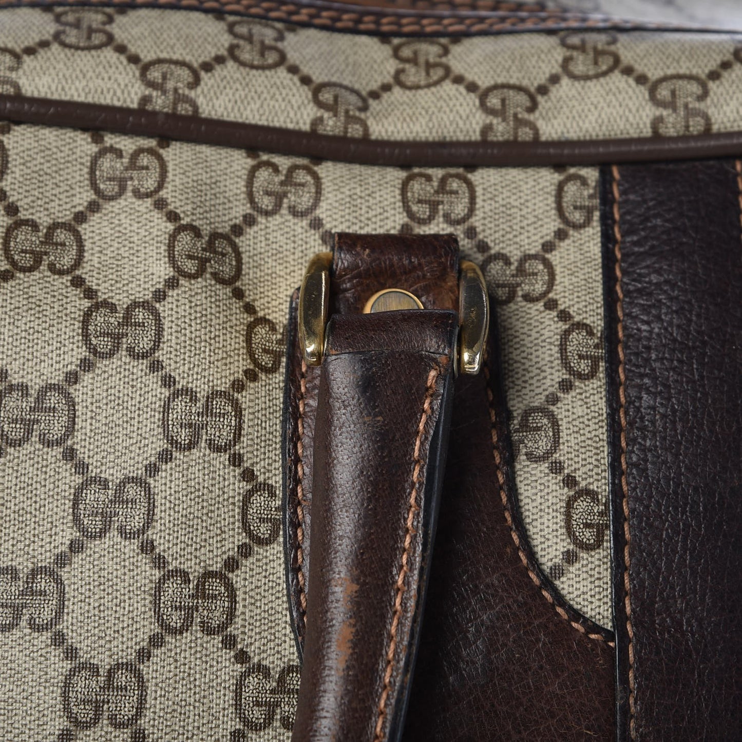 Monogram Joy Suitcase Luggage Brown