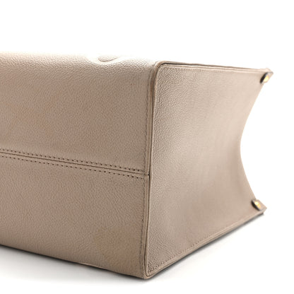 Louis Vuitton Empreinte Monogram Giant Onthego MM Tourterelle Creme 9 of 13