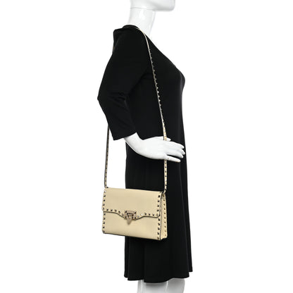 Valentino Garavani Pebbled Calfskin Medium Rockstud Flip Lock Crossbody Bag Light Ivory 2 of 12