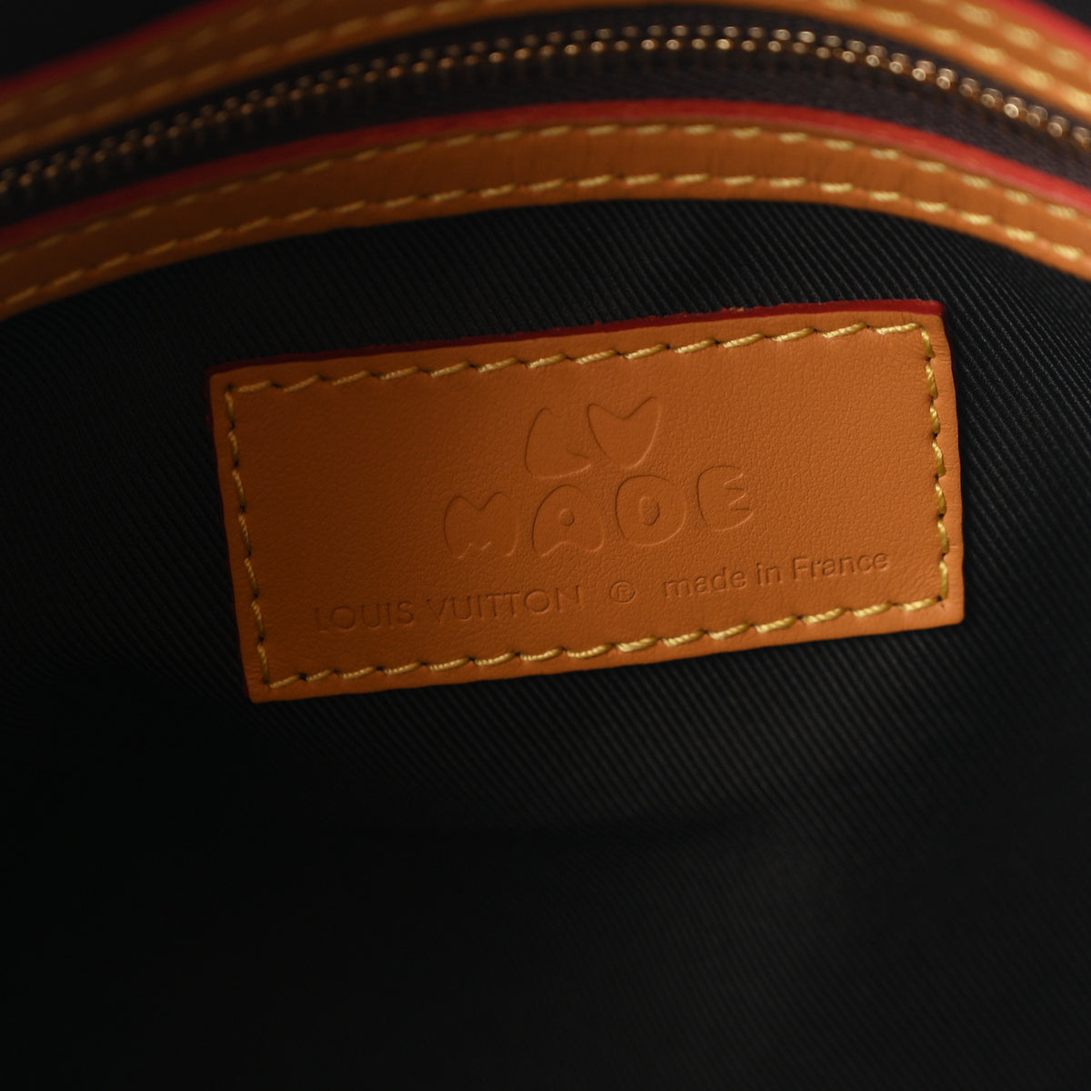 X NIGO Reverse Monogram Stripe Keepall Bandouliere 50 Brown
