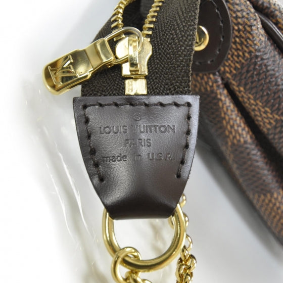 Damier Ebene Eva Clutch