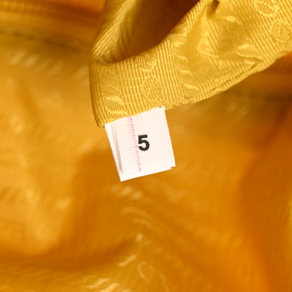 Prada Re-Nylon Vitello Metal Triangle Logo Sling Backpack Giallo 7 of 11