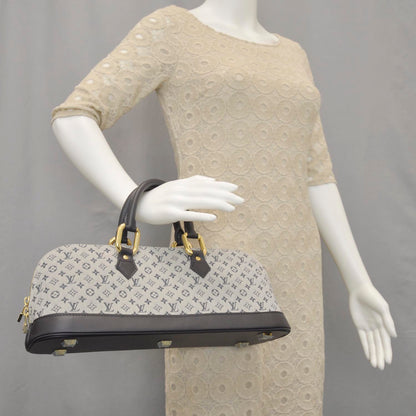Louis Vuitton Mini Monogram Alma Long 2 of 10