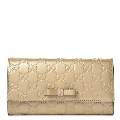 Gucci Metallic Guccissima Signature Bowy Continental Wallet Golden Beige 1 of 7