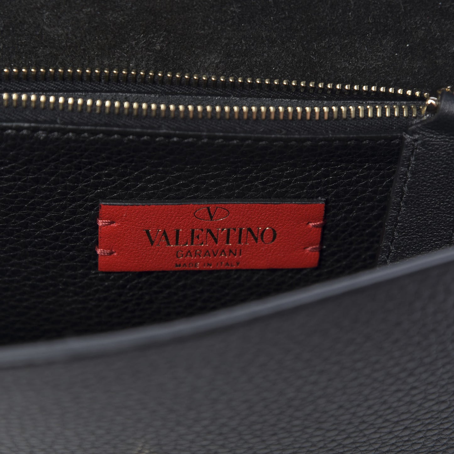 Pebbled Calfskin Rockstud Side Slip Crossbody Black