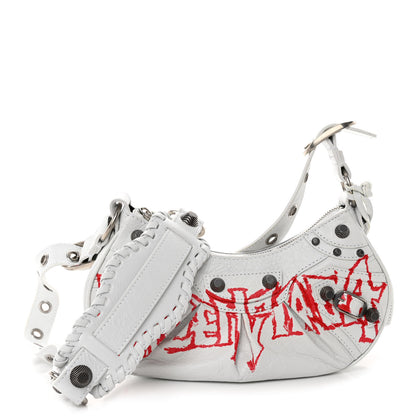 Balenciaga Agneau Arena Lunar New Year Graffiti Logo Le Cagole Shoulder Bag XS Optic White 1 of 10
