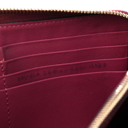 Valentino Garavani Calfskin Rockstud Zip Around Wallet Deep Cyclamin 9 of 9