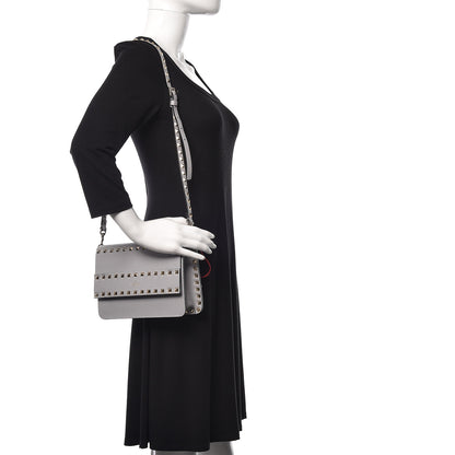 Valentino Garavani Pebbled Calfskin Rockstud Side Slip Crossbody Pastel Grey 1 of 10