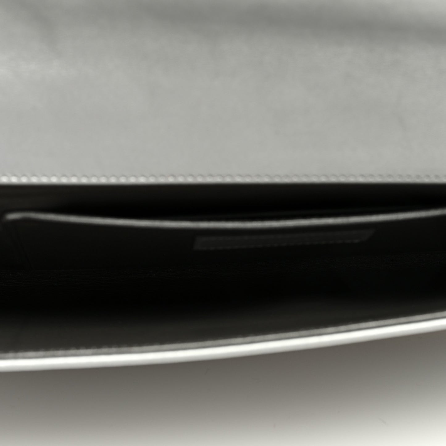 Metallic Calfskin Diagonal Clutch Silver