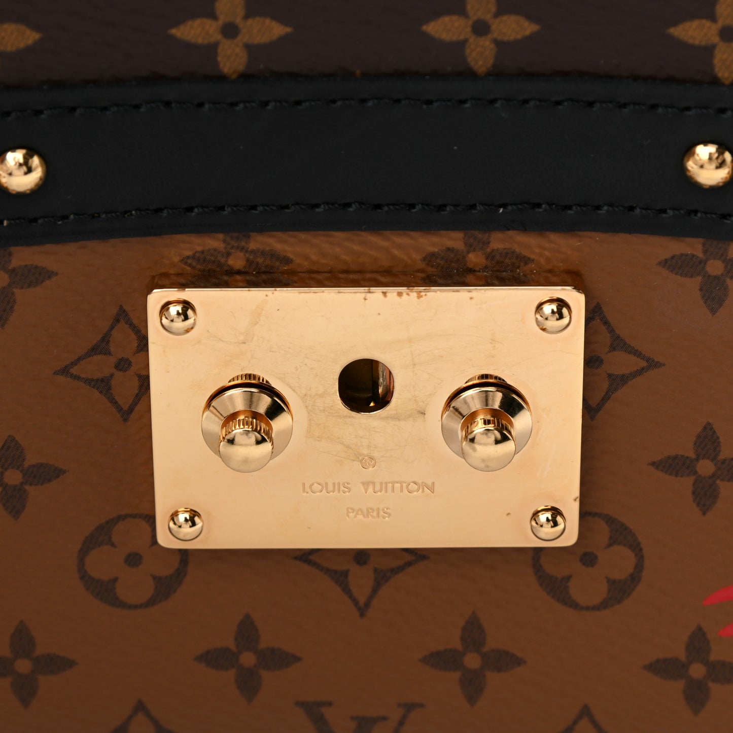 Reverse Monogram Trunk Clutch