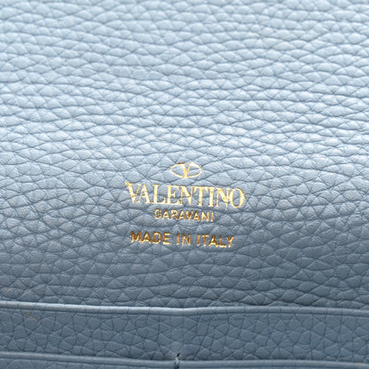 Valentino Garavani Pebbled Calfskin Rockstud Flip Lock Wallet On Chain Niagara 6 of 9