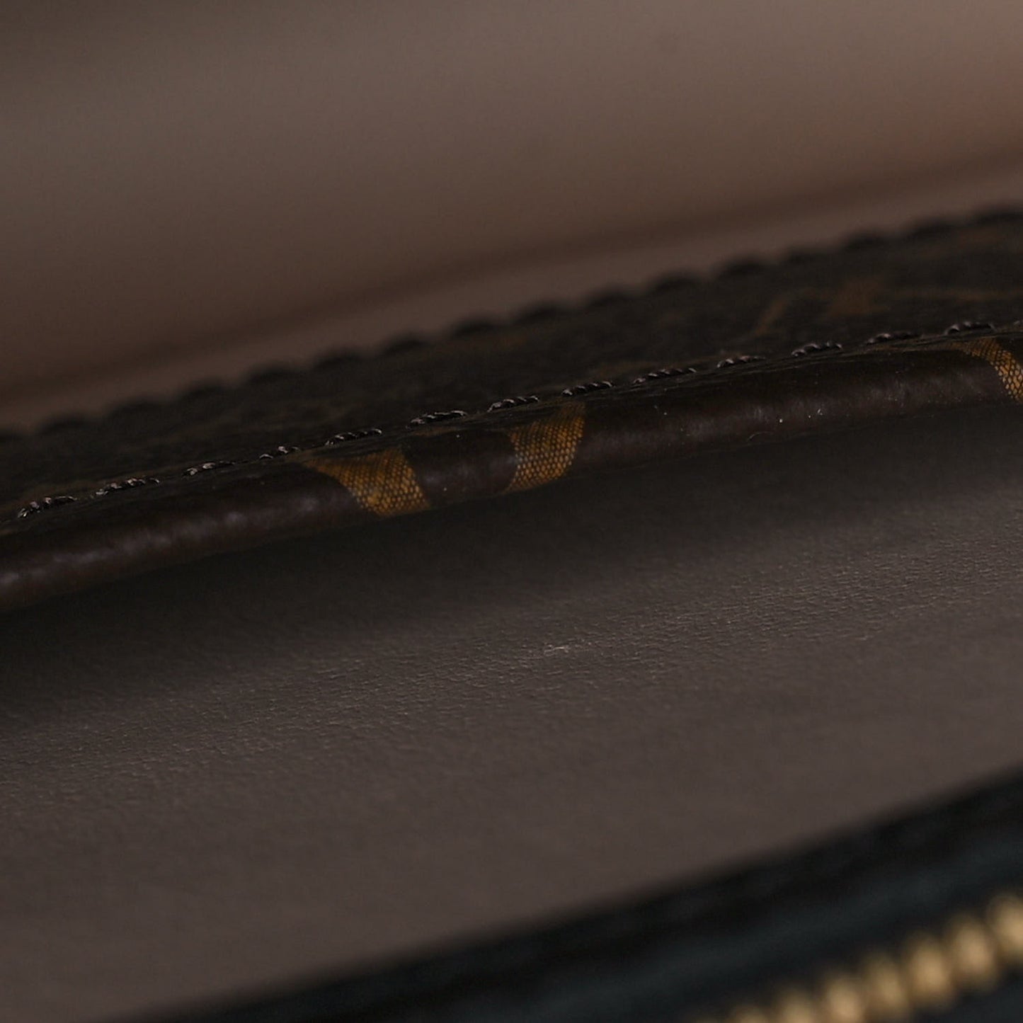 Reverse Monogram Trunk Clutch