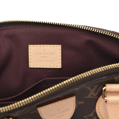 Louis Vuitton Monogram Rivoli PM 6 of 9