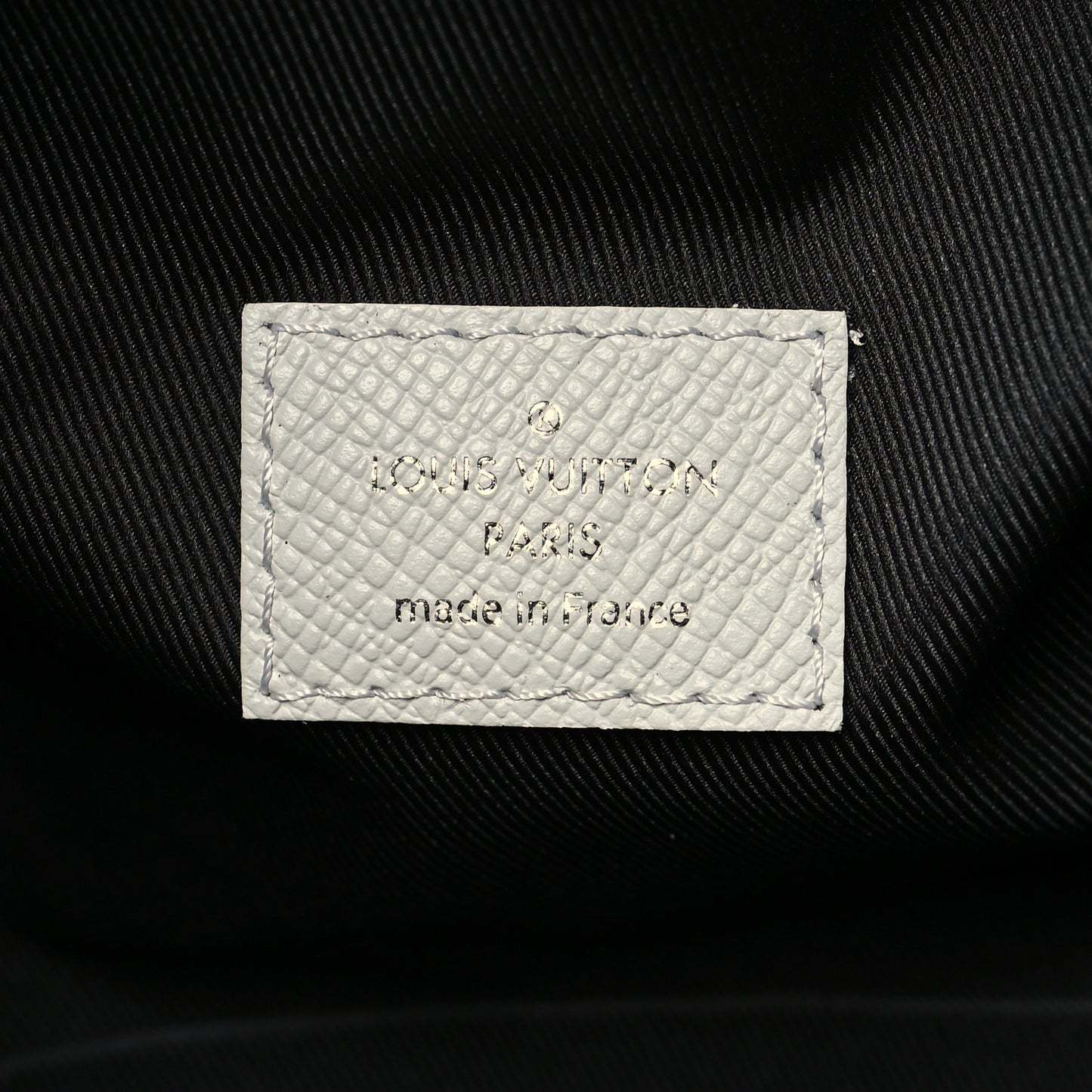 Taiga Monogram Discovery Backpack PM White