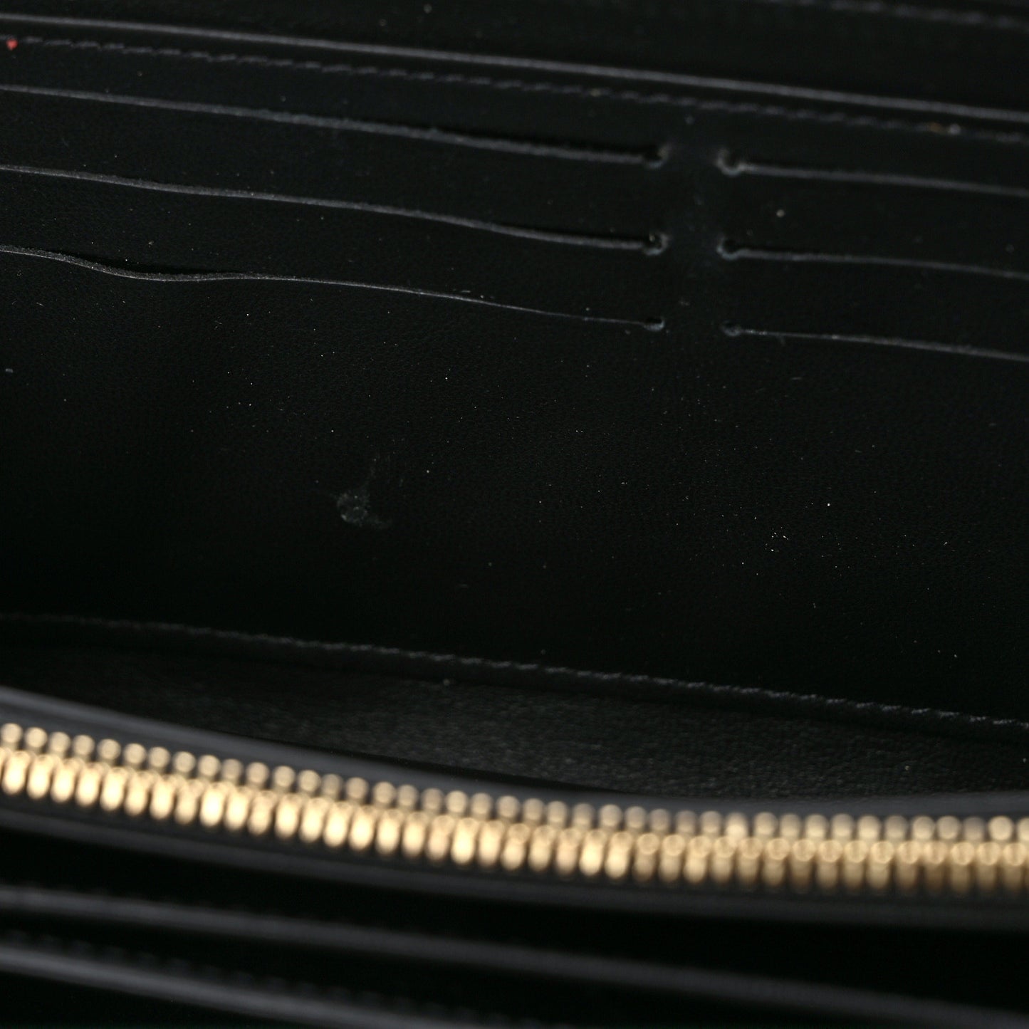 Lambskin Embossed Monogram Coussin Zippy Wallet Black