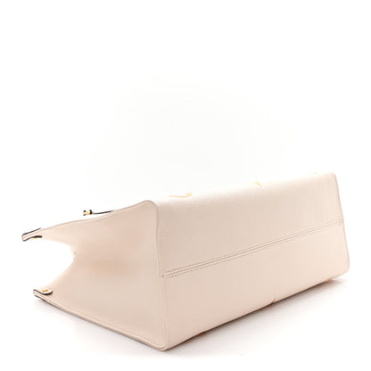 Louis Vuitton Empreinte Monogram Giant By The Pool Onthego MM Cream Saffron 4 of 9