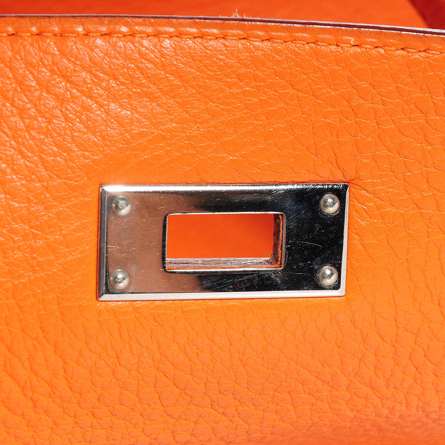 Togo Kelly Retourne 35 Orange