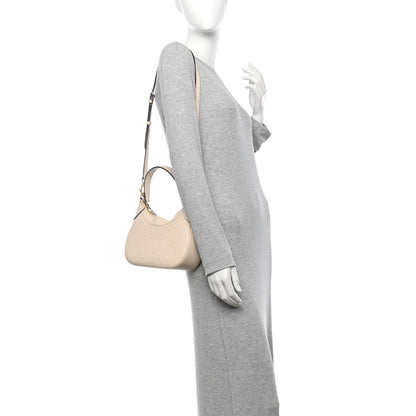Louis Vuitton Empreinte Monogram Giant Bagatelle NM Creme 2 of 9