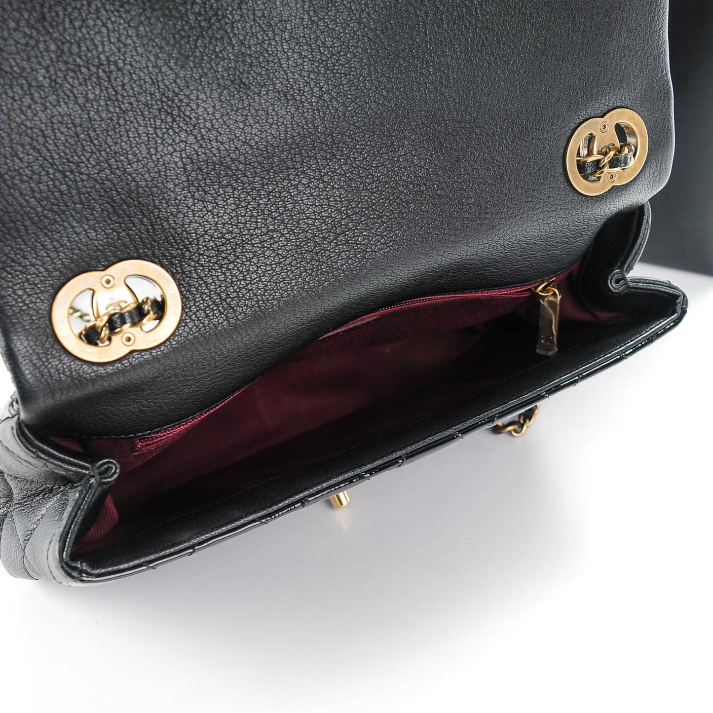 Patent Goatskin Quilted Medium CC Eyelet Flap Black