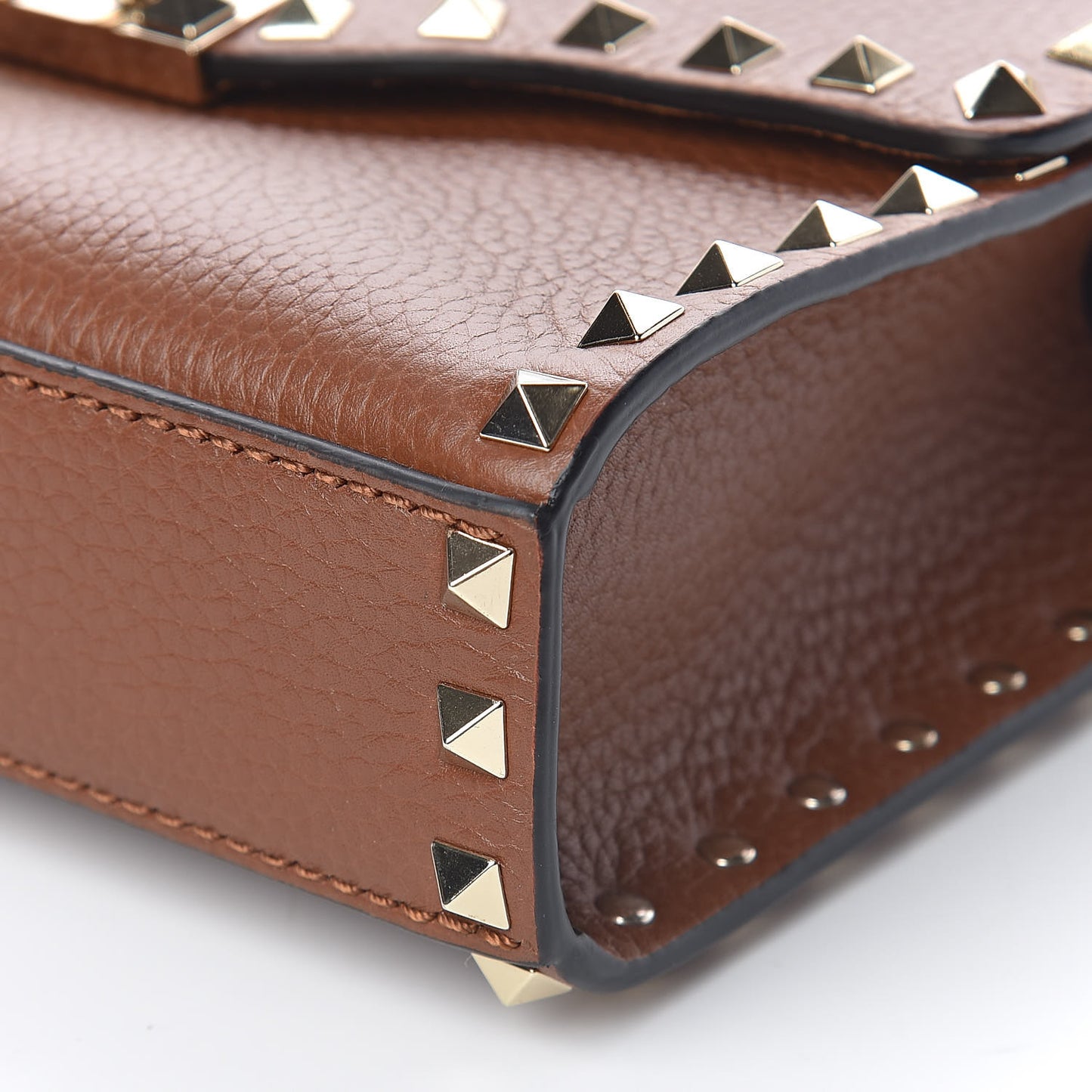 Pebbled Calfskin Medium Rockstud Flip Lock Crossbody Bag Bright Cognac