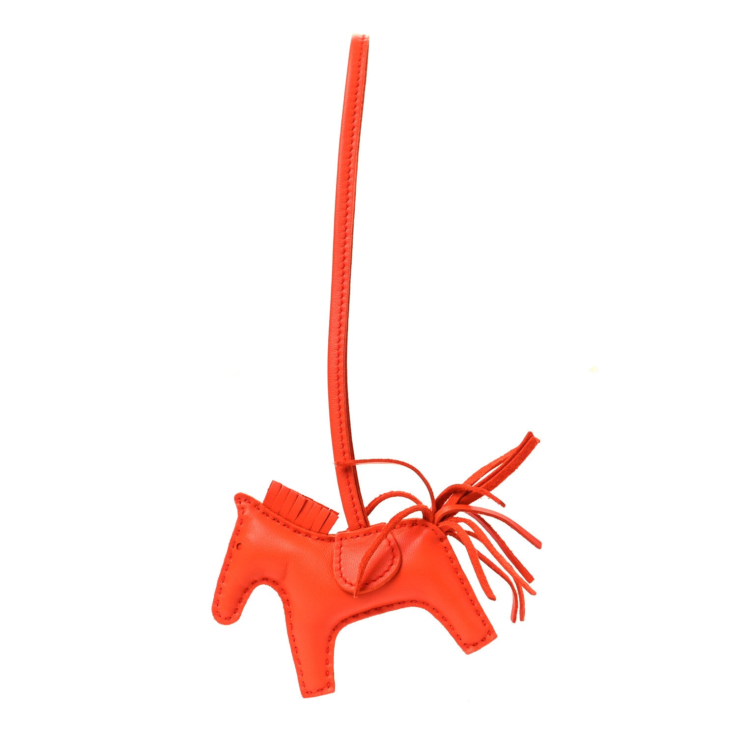 this is an image of an HERMES Milo Lambskin Grigri Rodeo Horse Bag Charm in size PM in the color Orange Poppy by fashionphile