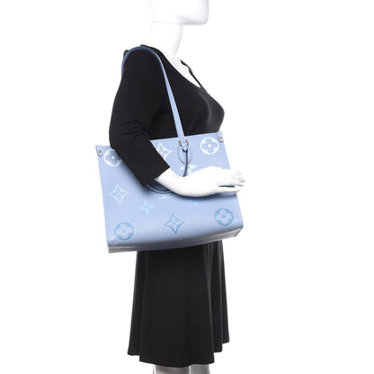 Louis Vuitton Empreinte Monogram Giant By The Pool Onthego MM Summer Blue 2 of 10