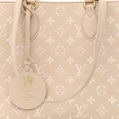Louis Vuitton Empreinte Monogram Spring In The City Onthego MM Beige Pink Yellow 7 of 9