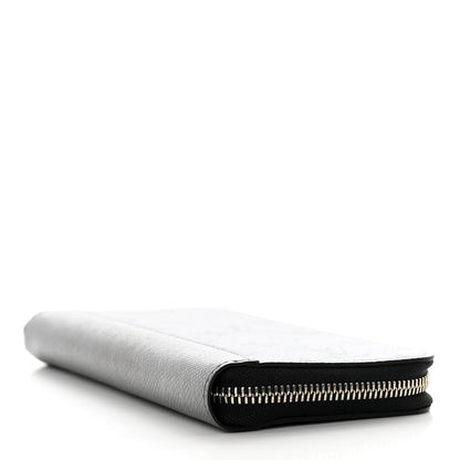Louis Vuitton Taigarama Vertical Zippy Wallet Silver 5 of 10