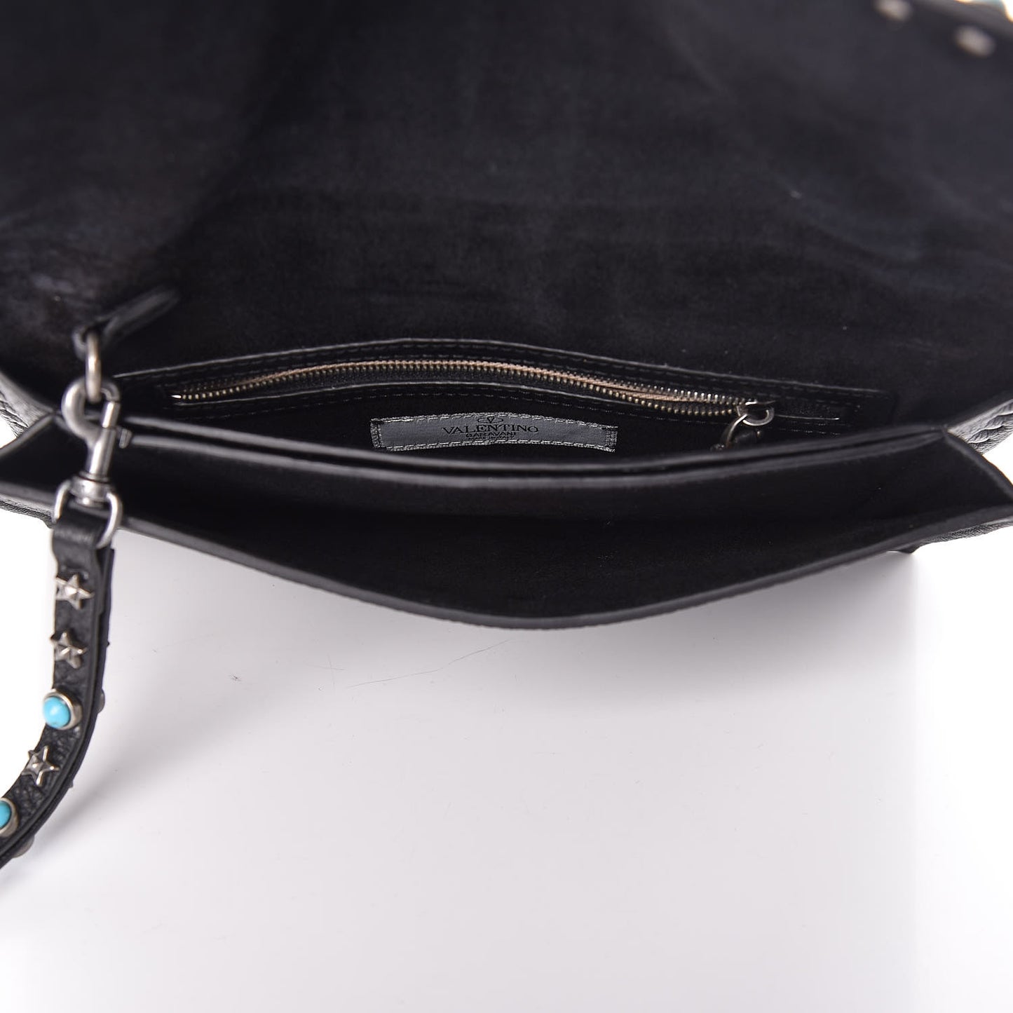 Pebbled Calfskin Star Rockstud Rolling Wristlet Clutch Black