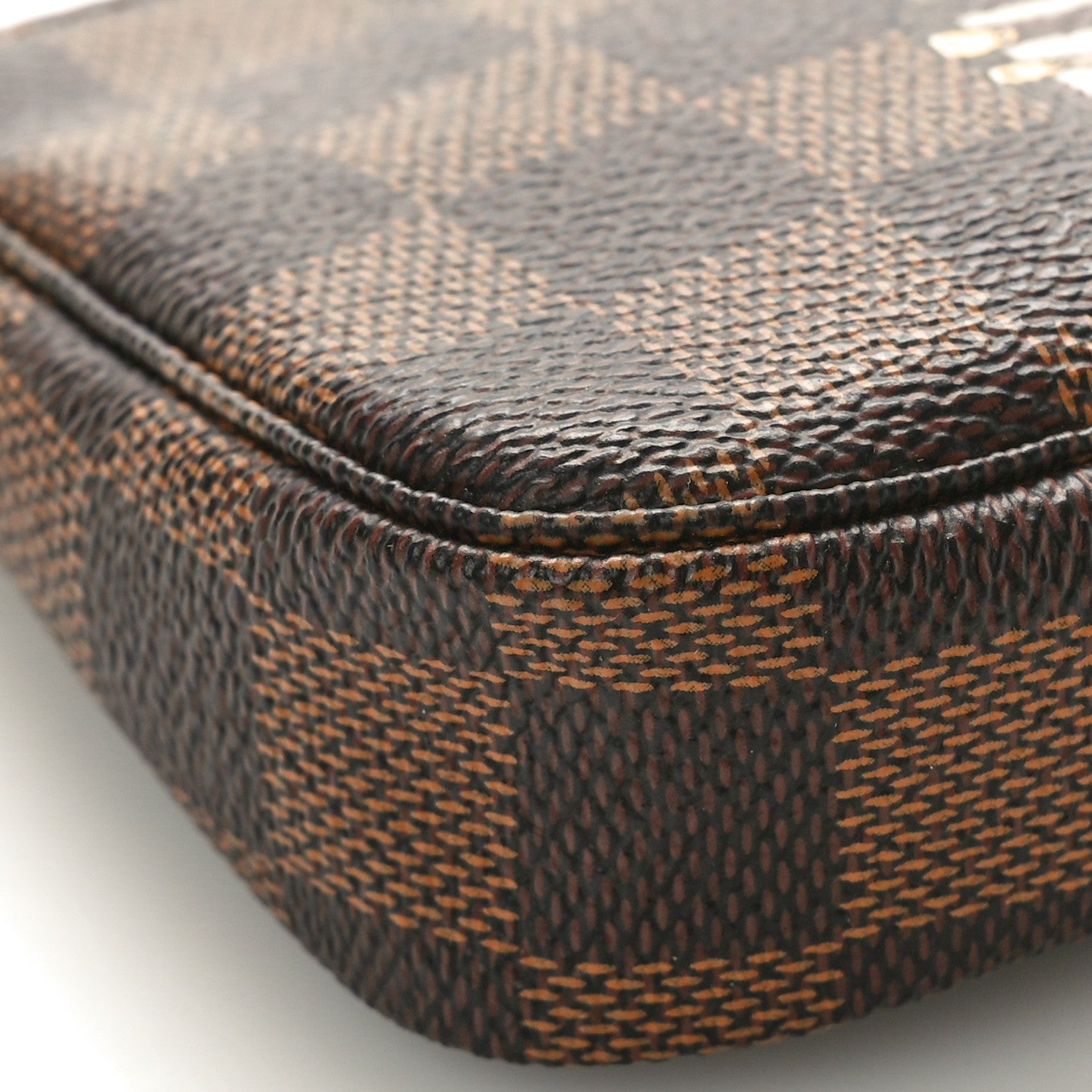 Damier Ebene Trunks and Locks Mini Pochette Accessories
