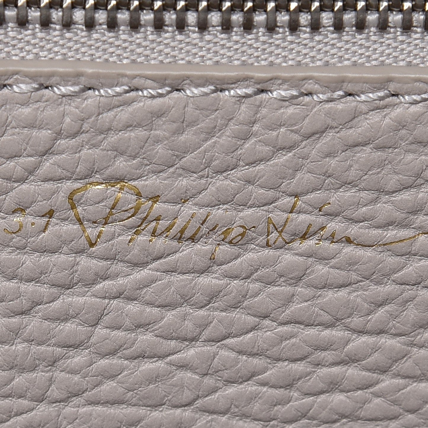 3.1 Textured Calfskin Pashli Backpack Feather