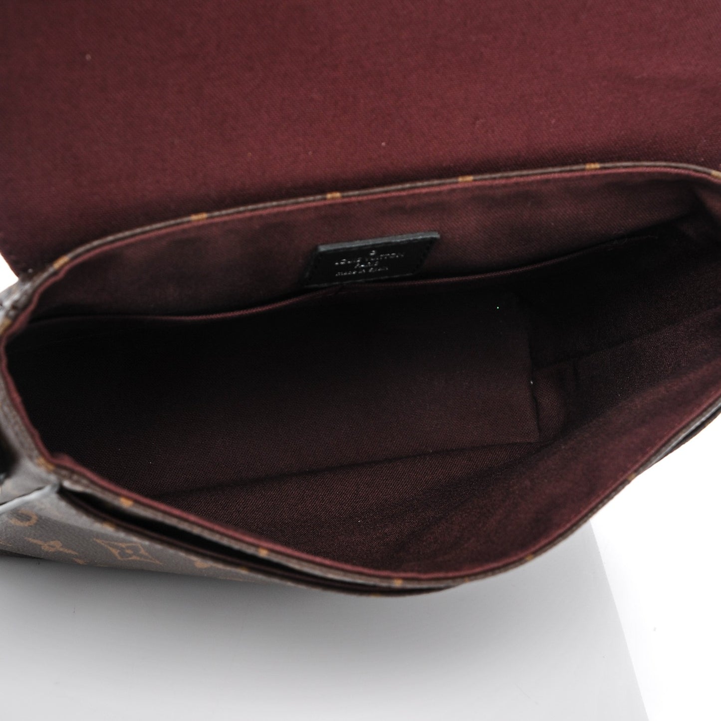 Monogram Macassar District PM