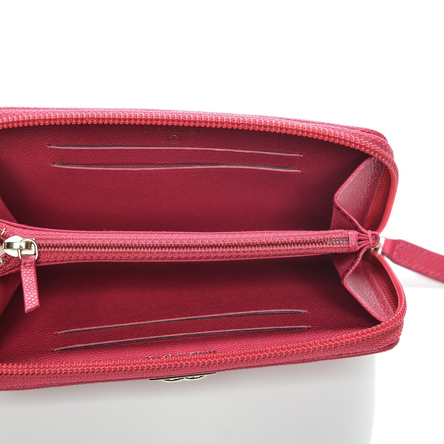 Caviar Quilted Small Boy Zip Around Wallet Fuchisa