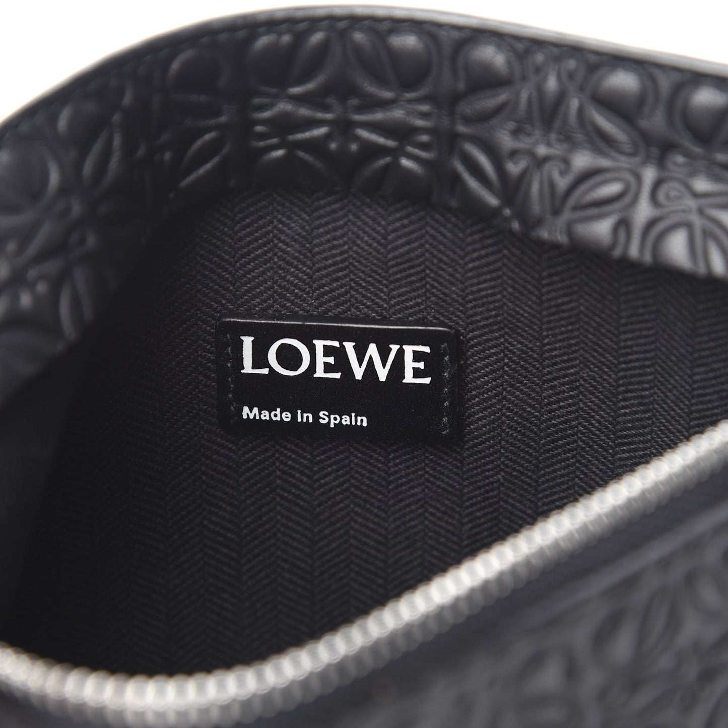 Calfskin Embossed Medium Repeat T Pouch Black