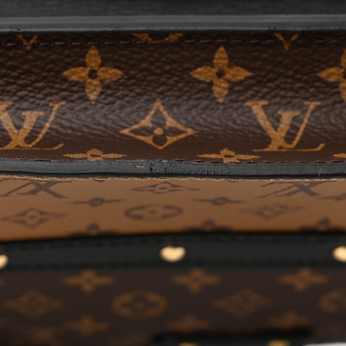 Reverse Monogram Trunk Clutch