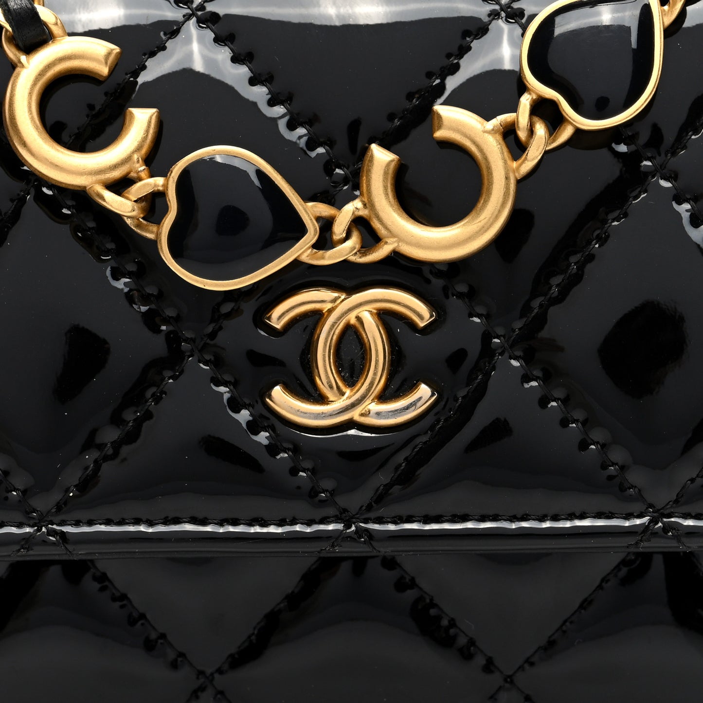 Patent Enamel Quilted Coco Hearts Clutch With Chain Black