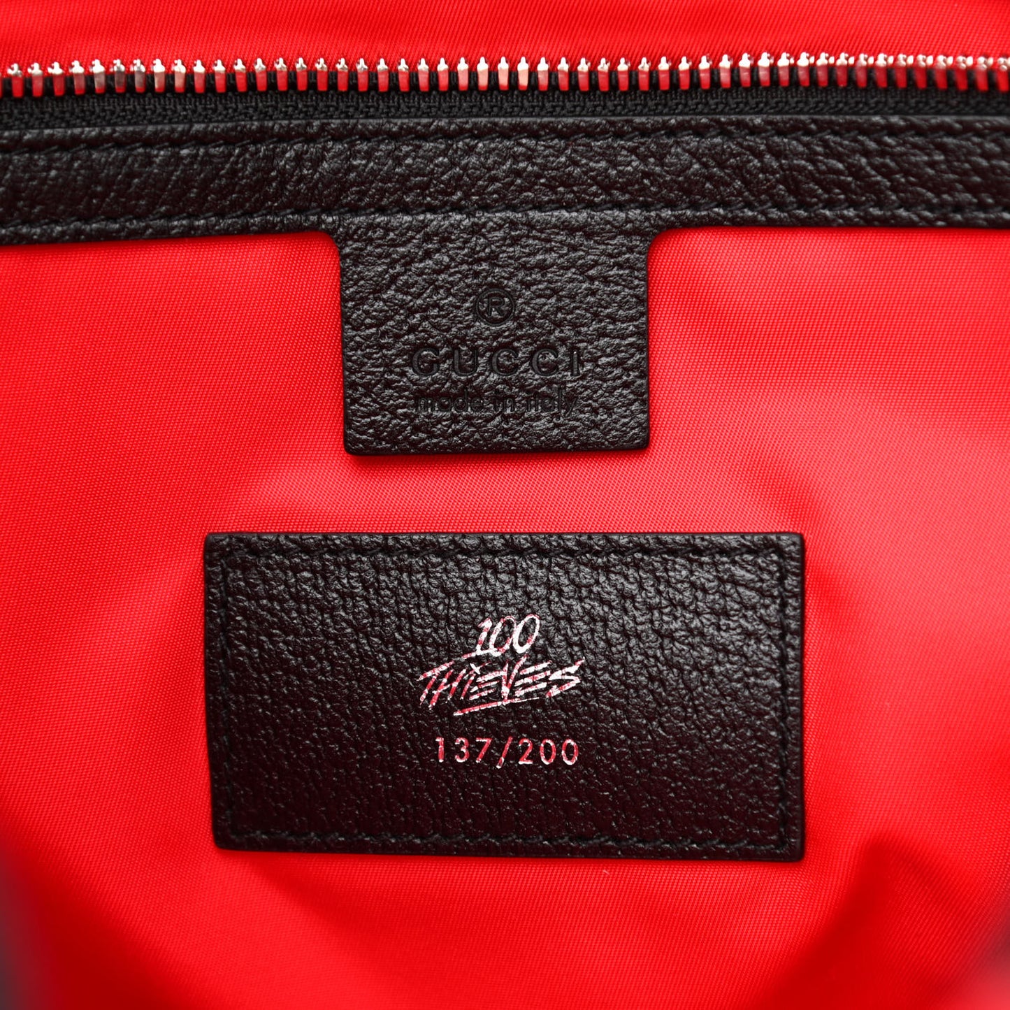 X 100 THIEVES Econyl Nylon Monogram Off The Grid Utility Pocket Backpack Red Black