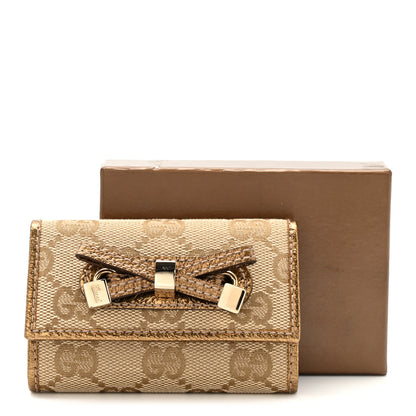 Gucci Metallic GG Supreme Monogram Bow 6 Key Holder Case    Beige Gold 17 of 18