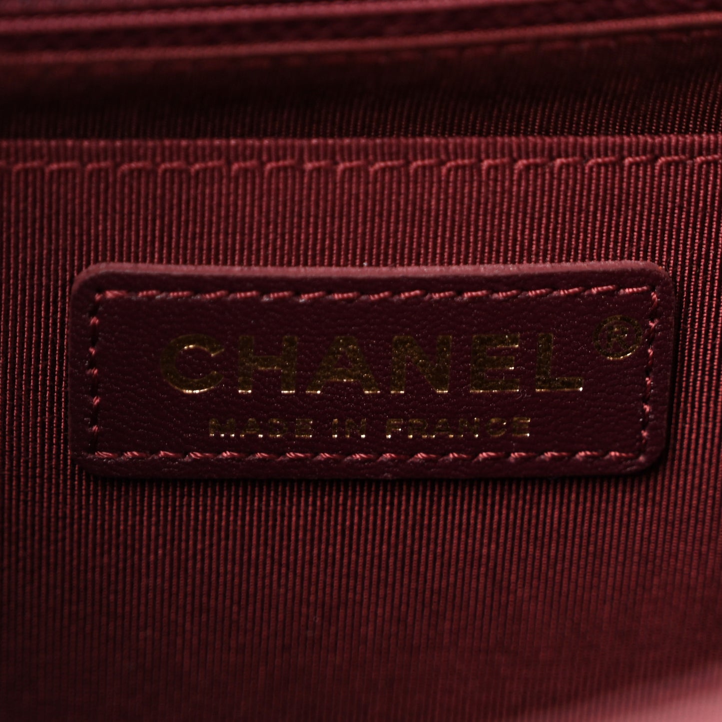 Aged Calfskin Chevron Quilted Backpack Red