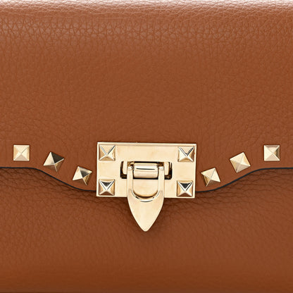 Valentino Garavani Pebbled Calfskin Medium Rockstud Flip Lock Crossbody Bag Saddle Brown 7 of 9