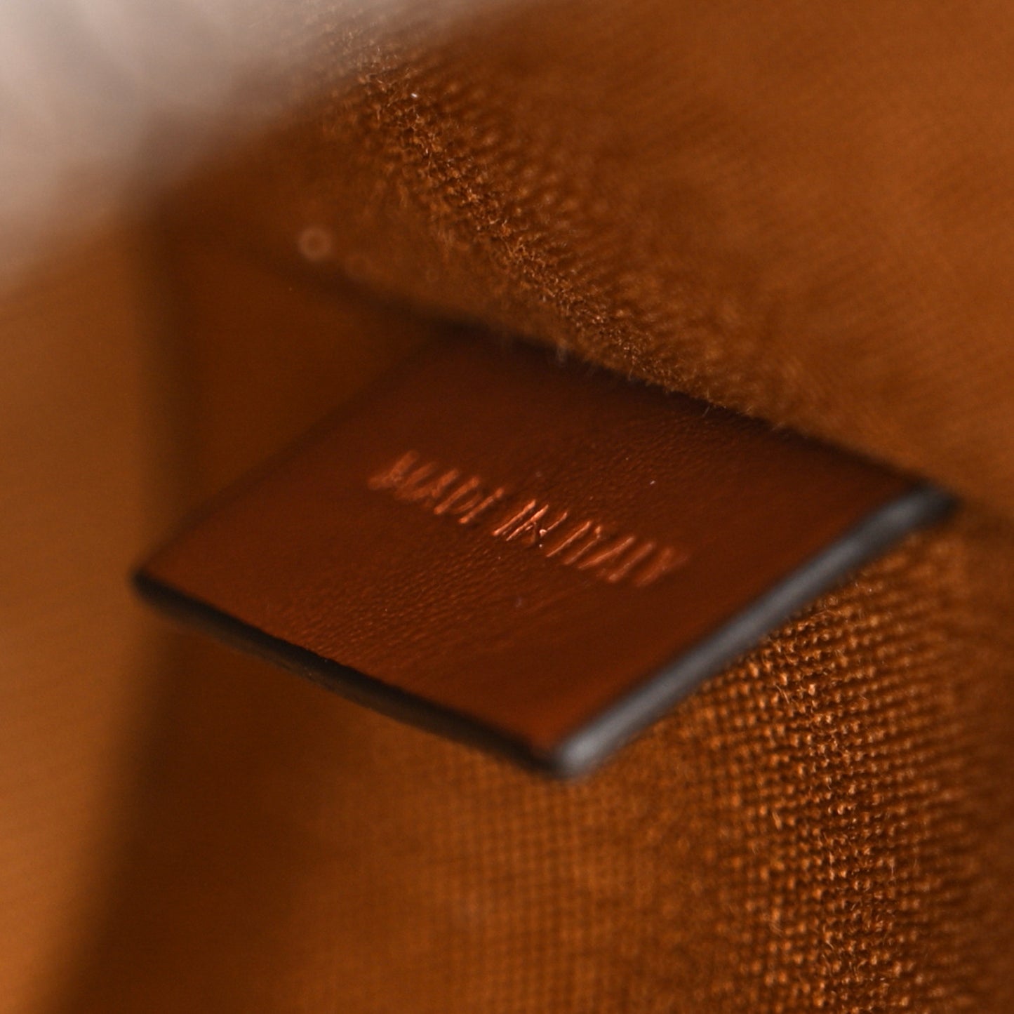 Triomphe Canvas Vertical Cylinder Bag Tan