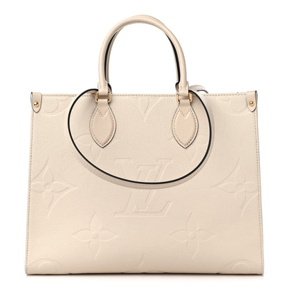 Louis Vuitton Empreinte Monogram Giant Onthego MM Creme 1 of 8